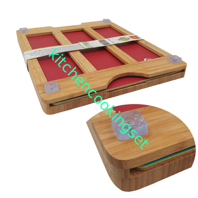Tutti in taglieri di legno uno con una varia dimensione di 6 stuoie flessibili di taglio